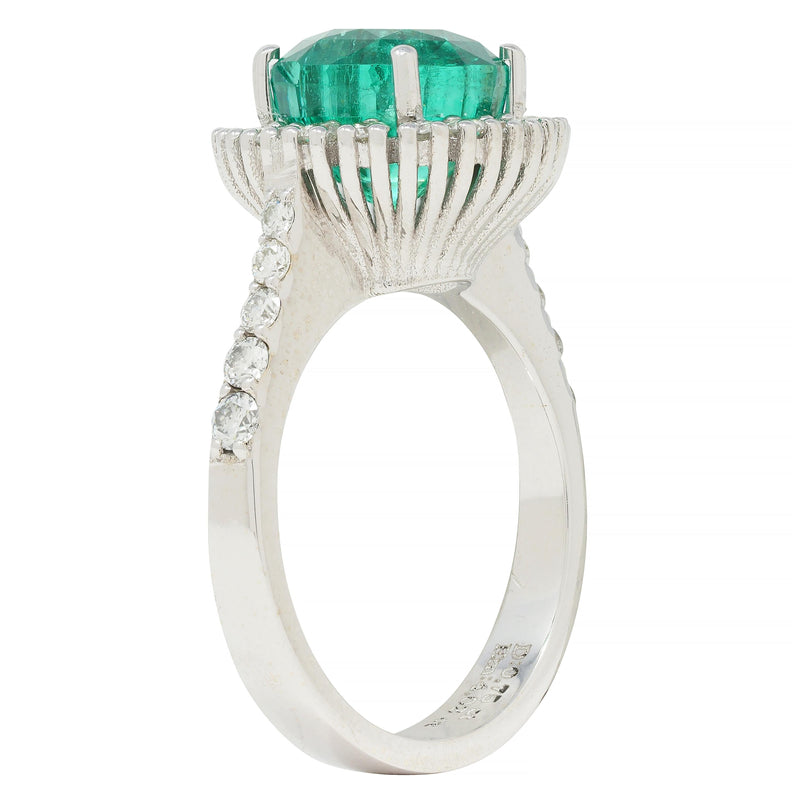 Contemporary 4.77 CTW Emerald Diamond 18 Karat Gold Halo Ring GIA