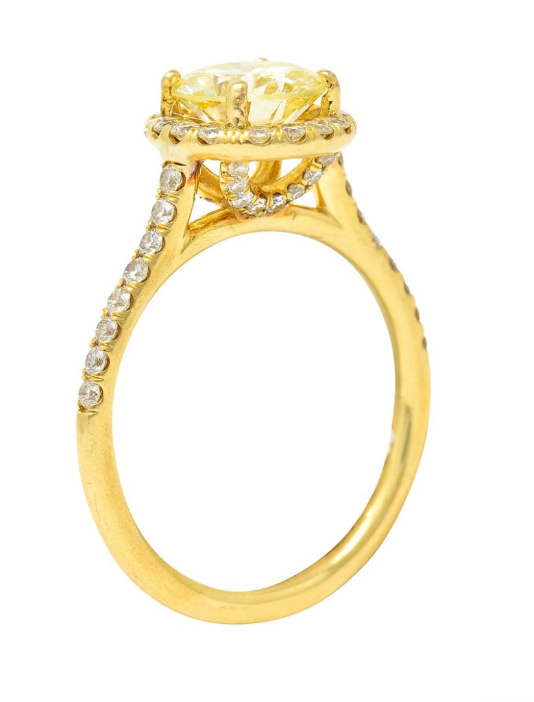 Contemporary 1.65 CTW Fancy Light Yellow Diamond 18 Karat Yellow Gold Halo Engagement Ring GIA