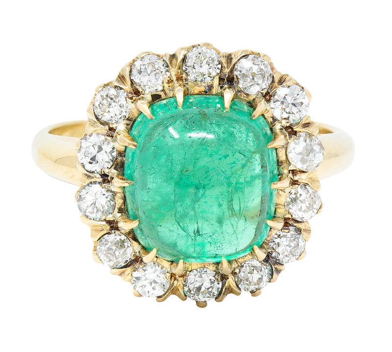 Victorian 6.28 CTW Colombian Emerald Cabochon Old European Cut Diamond 14 Karat Yellow Gold Antique Halo Ring GIA