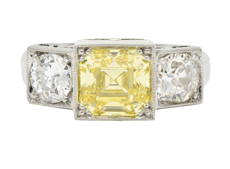 Art Deco 3.20 CTW Asscher Cut Fancy Intense Yellow & Old European Cut Diamond Platinum Foliate Vintage Ring GIA