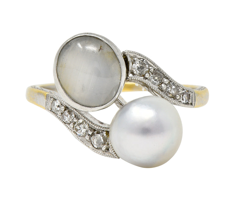 Edwardian Natural Pearl Star Sapphire Diamond Platinum-Topped 18 Karat Yellow Gold Toi-Et-Moi Antique Bypass Ring