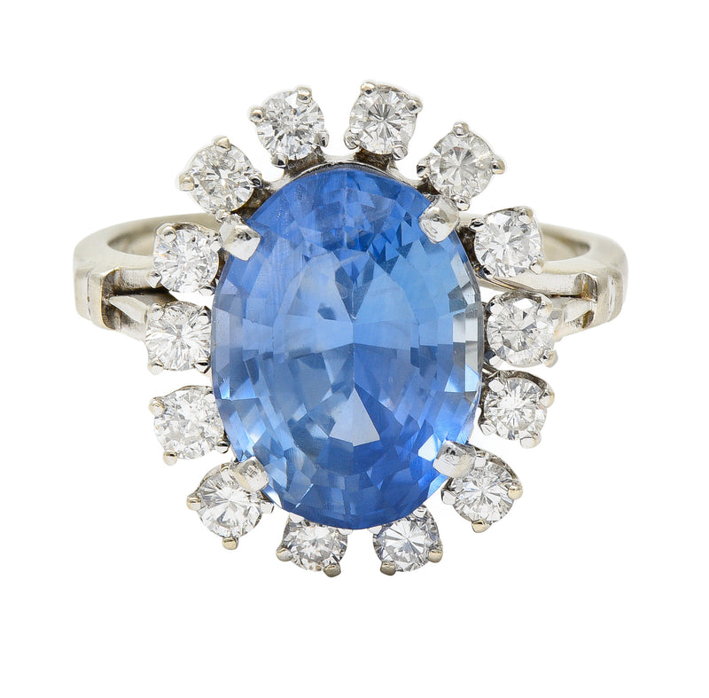 Mid-Century 7.03 CTW Oval Cut No Heat Ceylon Sapphire Diamond 14 Karat White Gold Vintage Halo Ring GIA