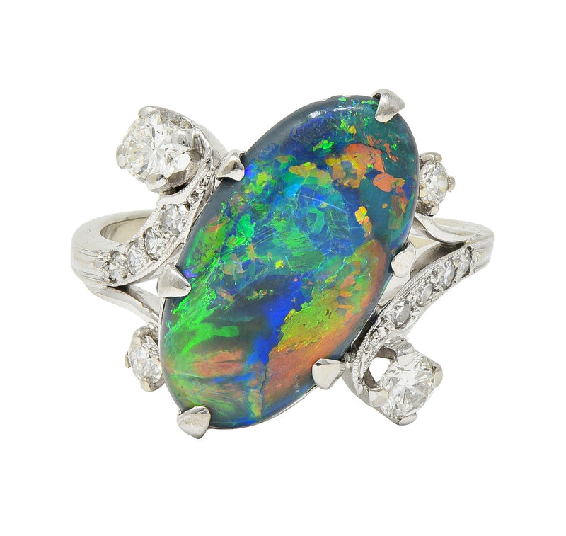 1950’s Black Opal Diamond 14 Karat White Gold Scrolling Navette Bypass Ring