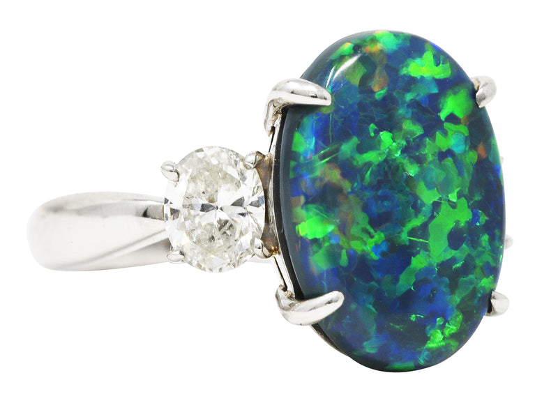 Black Opal Oval Cut Diamond Platinum Three Stone Gemstone Ring