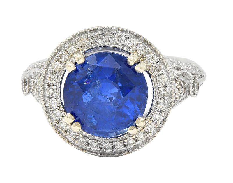 Contemporary 4.84 CTW Sapphire Diamond 14 Karat White Gold Halo Ring